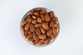Sweet almond dried fruit snack bowl on white background
