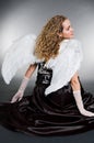 Sweet angel sitting Royalty Free Stock Photo