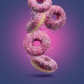 Sweet appetizing donuts on a pink-blue background.