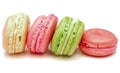 Sweet appetizing macaroon cookies on a white background.