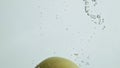 Sweet apple falling water closeup. Delicious garden fruit splashing dropping Royalty Free Stock Photo