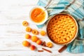 Sweet apricot pie on a wooden table Royalty Free Stock Photo