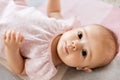 Sweet baby girl lying on knitted blanket Royalty Free Stock Photo