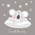 sweet baby Koala sleeps on a large pillow. Royalty Free Stock Photo