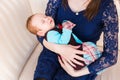 Sweet baby sleeping on hands mother Royalty Free Stock Photo