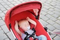 Sweet baby sleeping in stroller Royalty Free Stock Photo