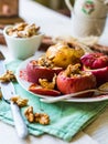 Sweet baked apples with walnuts and honey, dessert autumn