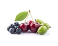 Sweet berries of blueberries,cherry and goosberry on white backgrounds