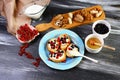 Sweet berry crostini sandwiches with ricotta, nuts, honey, red berries and blueberries on the whole grain bread bruschetta. Rustic Royalty Free Stock Photo