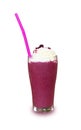 Sweet berry smoothie from black mulberry cream on top in a glass tall coaster tray with pink drinking straws.