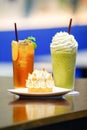 Sweet and beverate; Ice lemen tea and ice milk green tea with crown pie cake