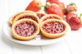 Sweet biscuits with strawberries jam Royalty Free Stock Photo