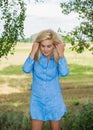 Lady in blue cotton tunic, clothes concept Royalty Free Stock Photo