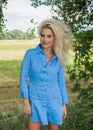 Lady in blue cotton tunic, clothes concept Royalty Free Stock Photo