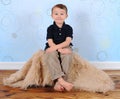Sweet boy posing with a silly grin Royalty Free Stock Photo