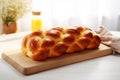 Sweet braided bread in light kitchen interior