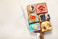 Sweet breakfast. Colorful toasts with fruits and berries. Children\'s food concept