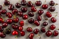 Fresh raw red sweet cherry on grey wood Royalty Free Stock Photo