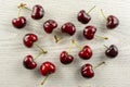 Fresh raw red sweet cherry on grey wood Royalty Free Stock Photo