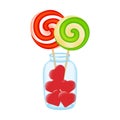Sweet bright spiral round lollipops in a glass jar