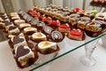 Sweet buffet - chocolate cakes, souffle and Swiss rolls, catering