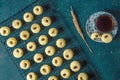 Sweet butter cookies with nuts on grid Royalty Free Stock Photo