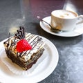 Sweet cake, dessert with cream and poppy seeds, coffee