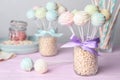 Sweet cake pops on pink table. Space for text Royalty Free Stock Photo