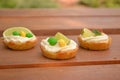 Sweet cakes on wooden table