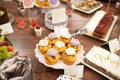 Sweet candy bar.Different delicious fruits and cakes on wedding reception table . Royalty Free Stock Photo