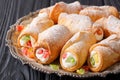 Sweet cannoli stuffed with cheese cream and candied fruits close Royalty Free Stock Photo