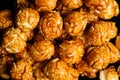 sweet Caramel Cream popcorn on the black background