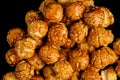 sweet Caramel Cream popcorn on the black background