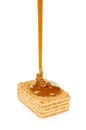 Sweet caramel sauce is poured Royalty Free Stock Photo