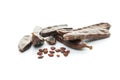 Sweet carob pods with seeds on white background