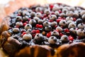 Sweet cheese cake with licorice and fruits Royalty Free Stock Photo