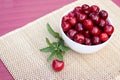 Sweet cherries in a white cup Royalty Free Stock Photo