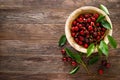 Sweet cherry with leaves in wooden bowl. Fresh ripe cherries. Cherry fruit Royalty Free Stock Photo