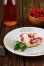 Sweet cherry pie with herb leaves on white plate Royalty Free Stock Photo