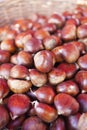 Sweet chestnuts - marron in basket Royalty Free Stock Photo