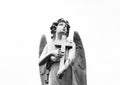 Sweet child angel carrying the cross Royalty Free Stock Photo
