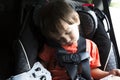Sweet Child In His Safety Car Seat Royalty Free Stock Photo