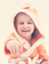 Sweet child pointing at something and laughing Royalty Free Stock Photo