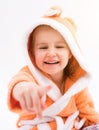 Sweet child pointing at something and laughing Royalty Free Stock Photo