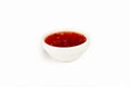 Sweet chili sauce in a bowl on a white background. For the restaurant menu. Traditional Japanese sushi seasoning