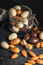 Sweet chocolate almonds. Chocolate eggs in jar Royalty Free Stock Photo