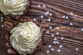 Sweet chocolate desserts with white hearts on wooden background, valentines or wedding cake, love Royalty Free Stock Photo