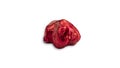 Sweet chocolate heart shaped candy wrapped in red foil papper on white background. Royalty Free Stock Photo