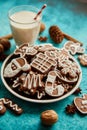 Sweet Christmas composition. Assortment of gingerbread cookies on a plate