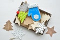 Christmas sweet gingerbreads in wooden box with snowflakes, stars and fur-trees